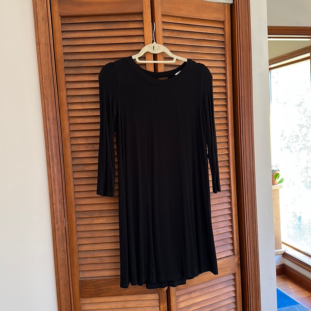 Black ribbed swing dress with back cut out